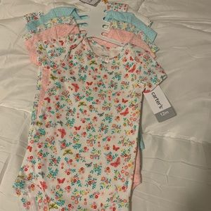 Carter’s 5 pack of brand new 12M body suits